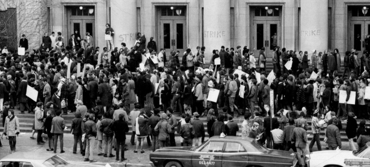 A photo of Black Action Movement students picketing in front of Hill Auditorium in March 1970.