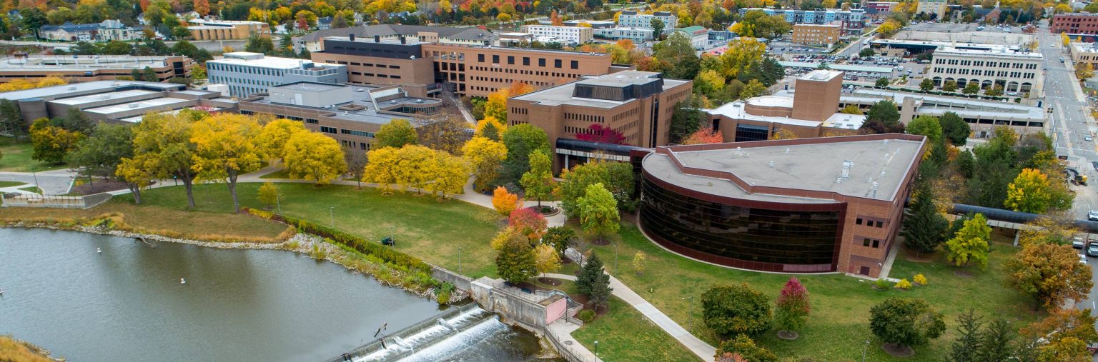 A photo of the U-M Flint campus with the city in the background by Eric Bronson.
