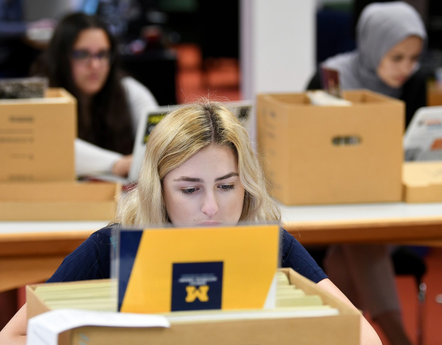A photo of students researching at the Bentley Historical Library.